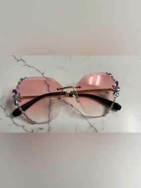 PINK RIMLESS SUNGLASSES WITH RHINESTONE EMBELLISHMENTS